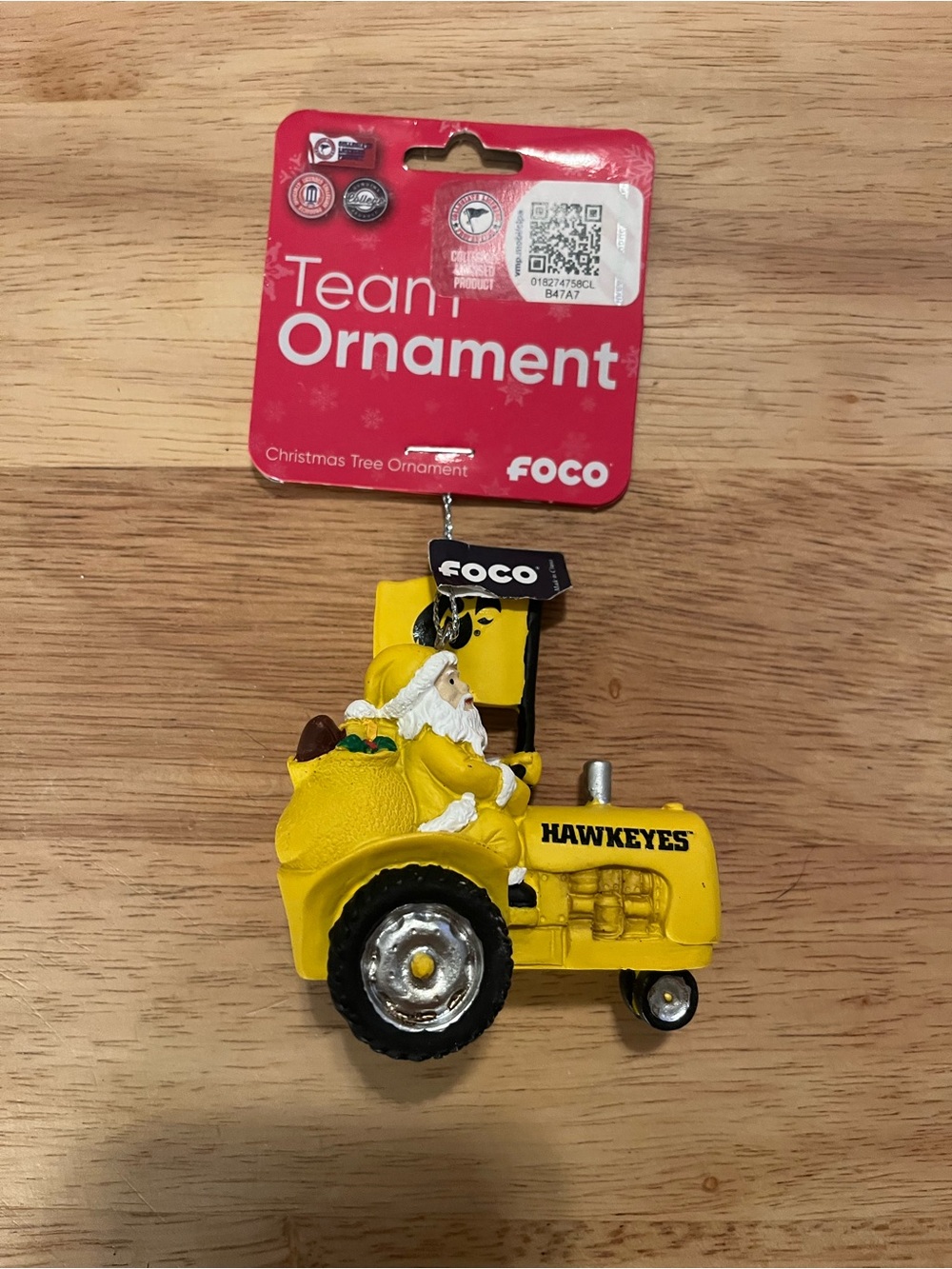 Hawkeyes Yellow Santa Riding Tractor Ornament 3”